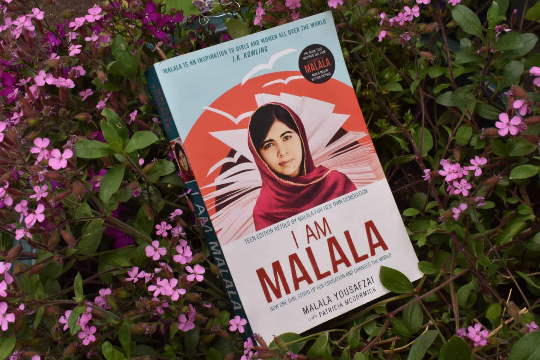 Books About Kindness for Kids: Picture of Book 'I am Malala' with pink flowers behind
