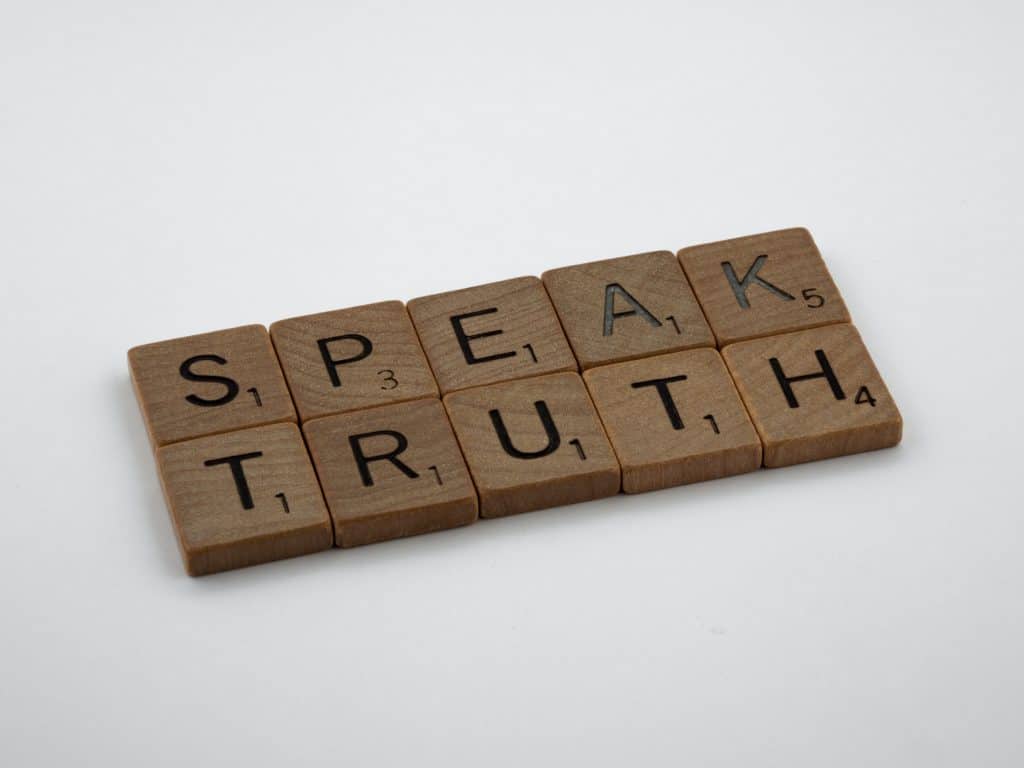 Scrabble letters spelling 'Speak Truth'