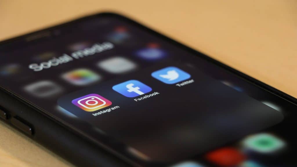 Mobile phone showing social media apps