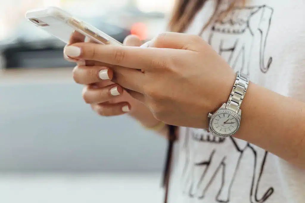 Girl holding a mobile phone