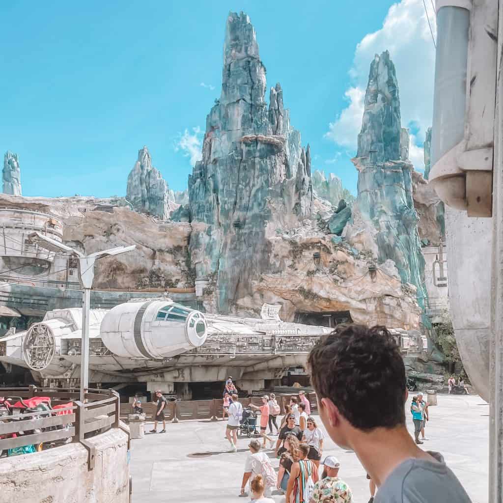 Boy looking at Star Wars spaceship at Disney