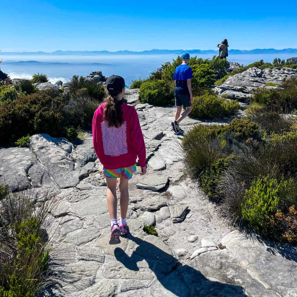 Children walking on top of Table Mountain in Cape Town