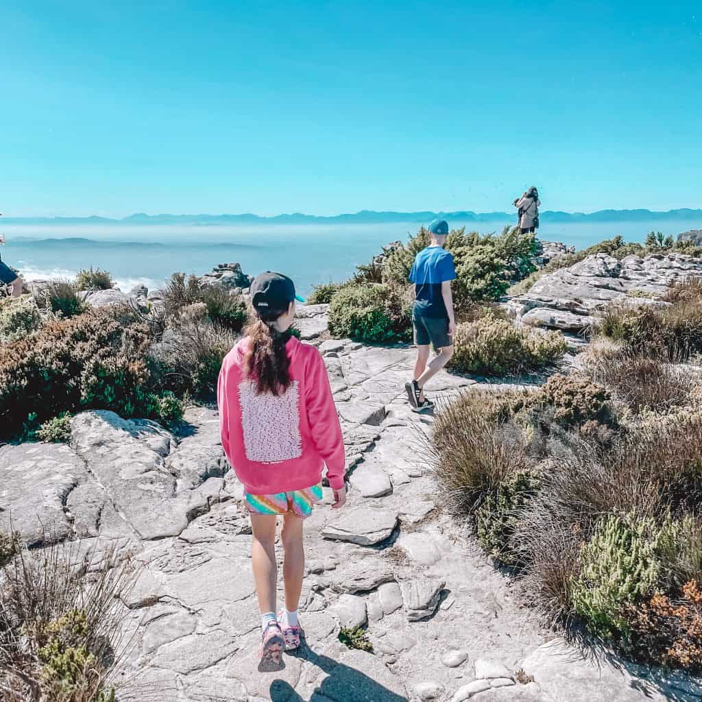 Children walking on the top of Table Mountain in Cape Town
