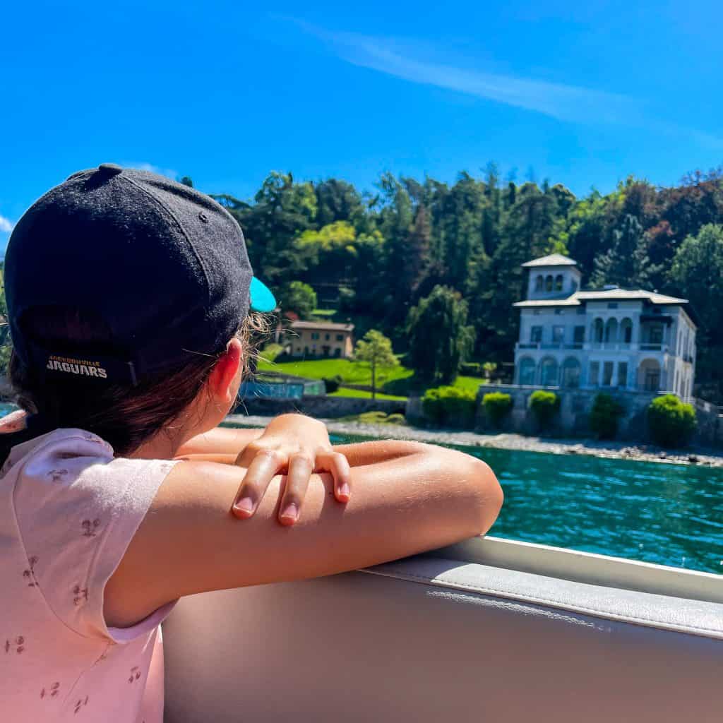 Child looking out from a boat 