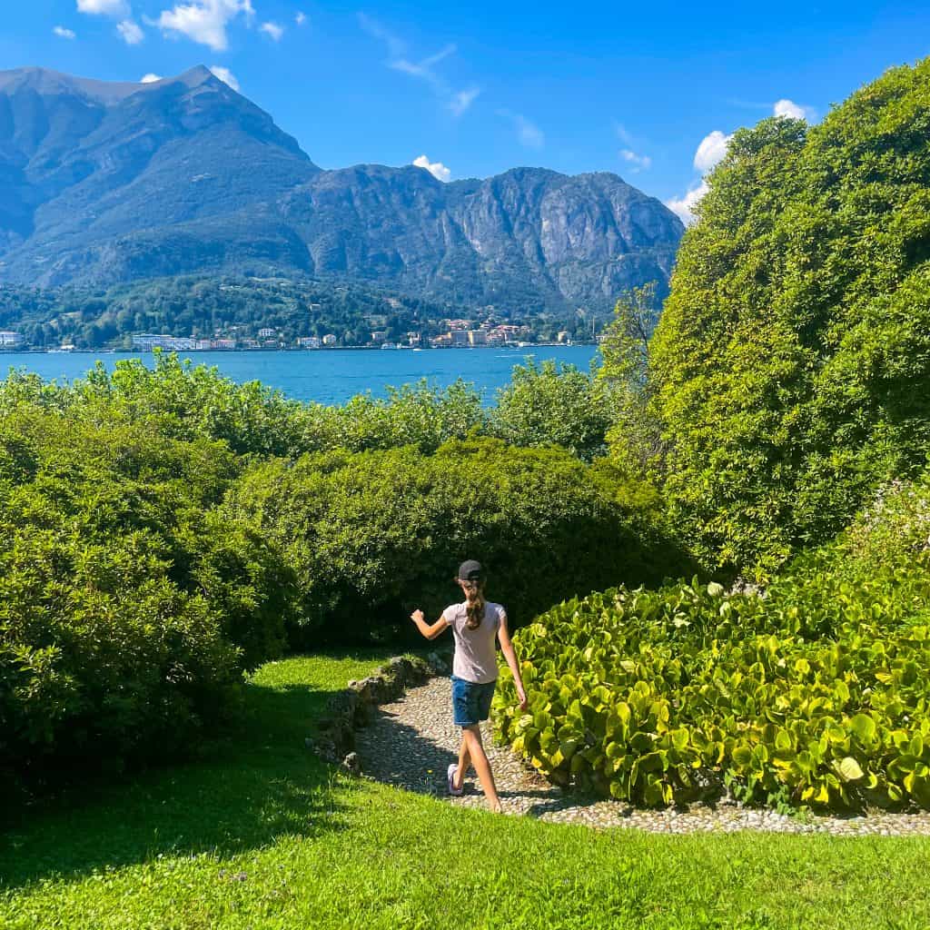 Child walking on a path in gardens at Villa Melzi