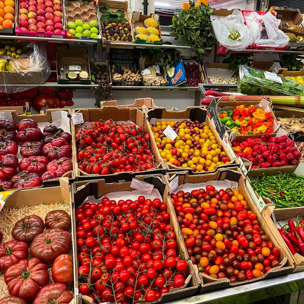 Tomatoes and other vegetables at a food market