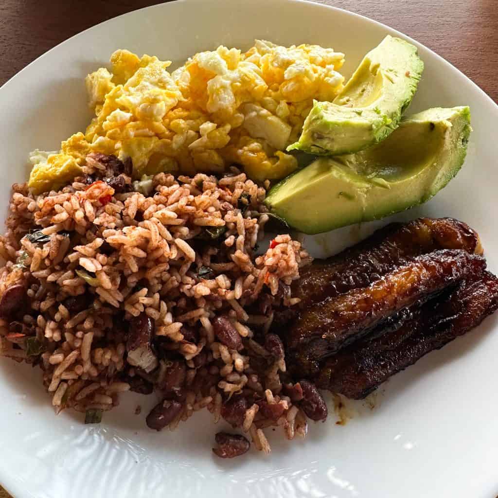 Costa Rican breakfast of rice and beans, scrambled egg, avocado and plantain