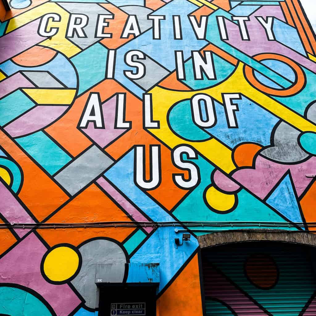 Street Art in London reading 'Creativity is in all of us'