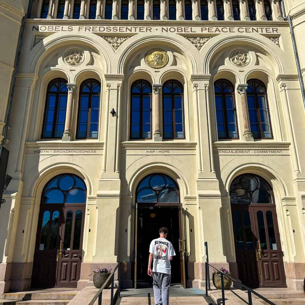 Boy walking into building (Nobel Peace centre)