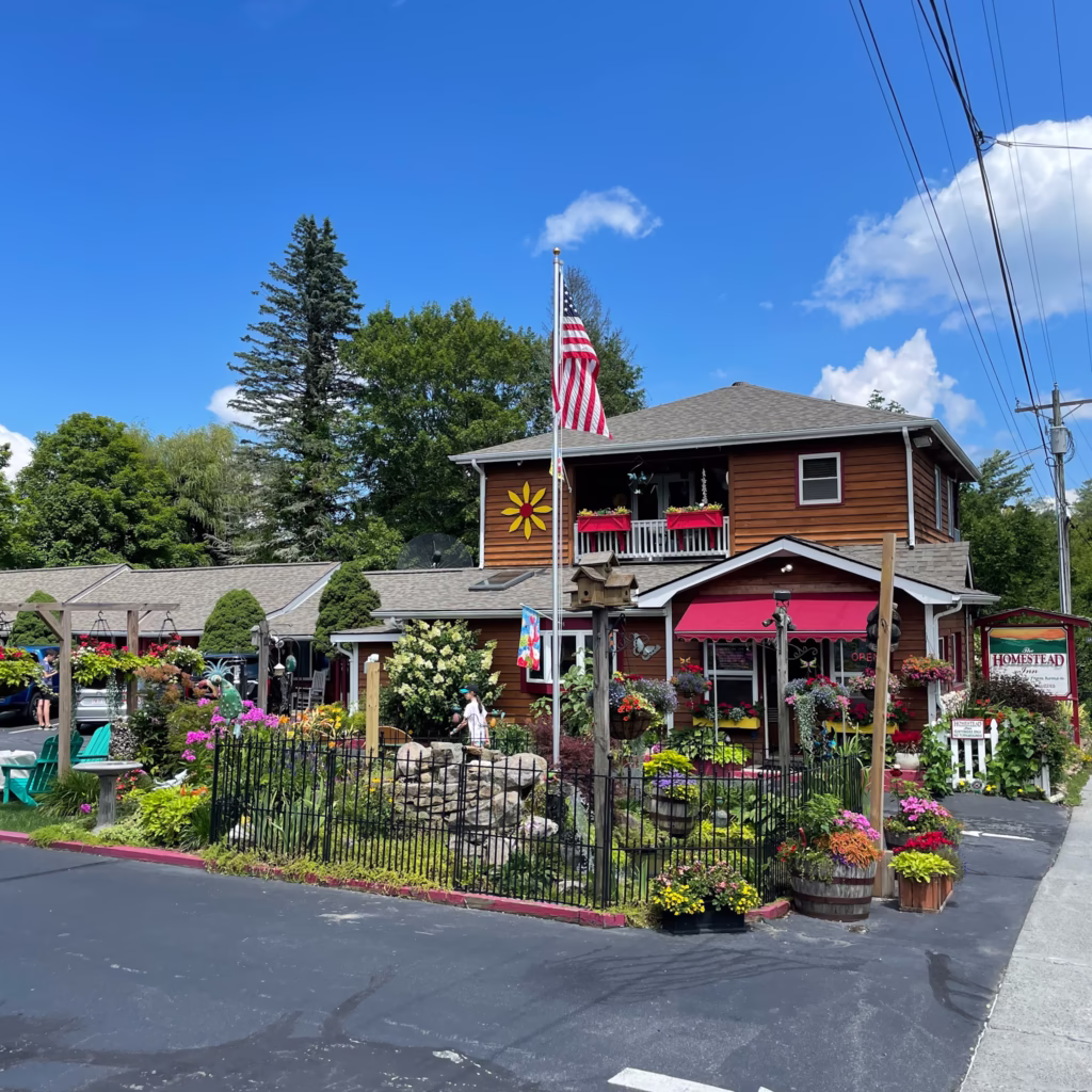 Colourful hotel with flowers outside